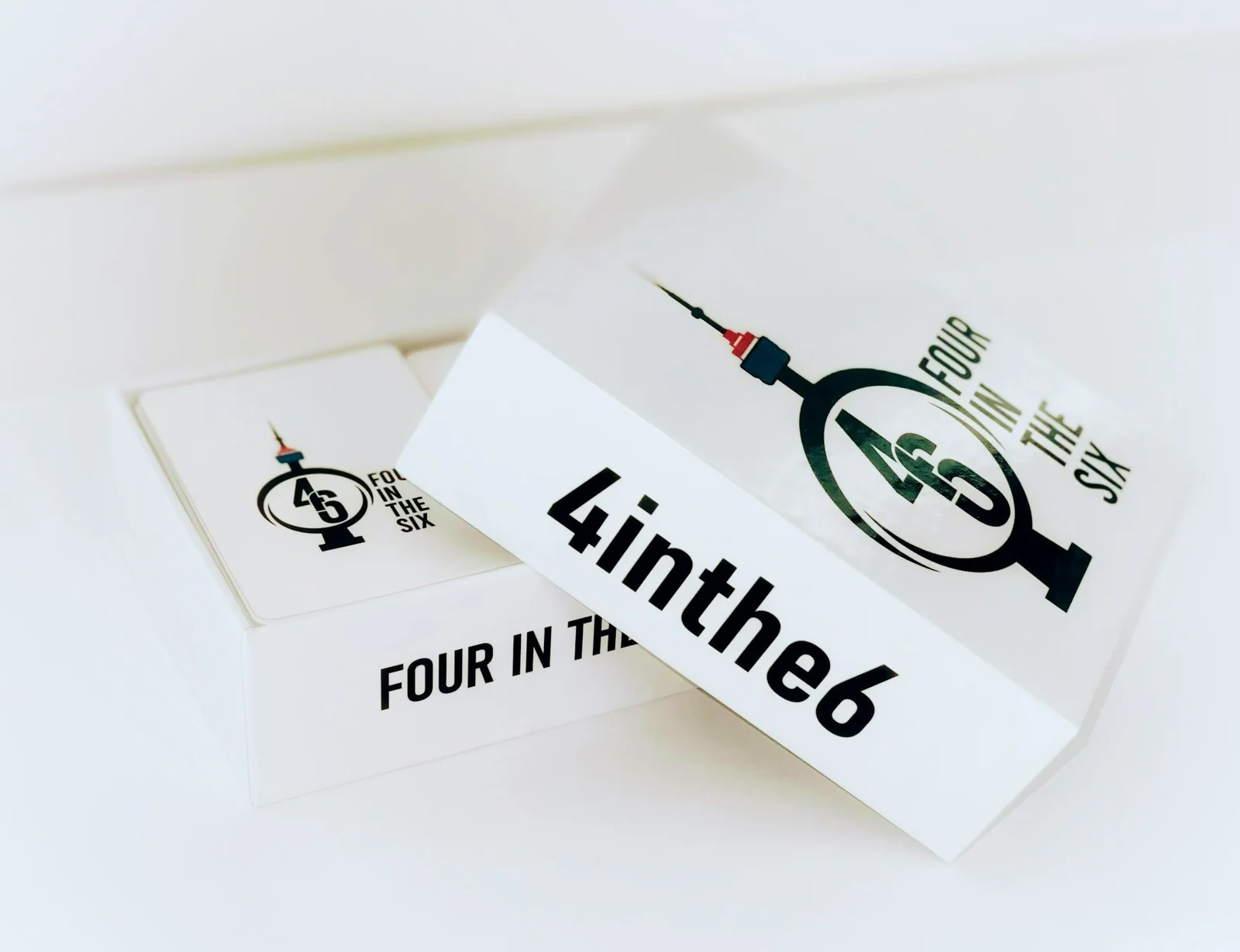 Actual 4inthe6 game packaging and cards
