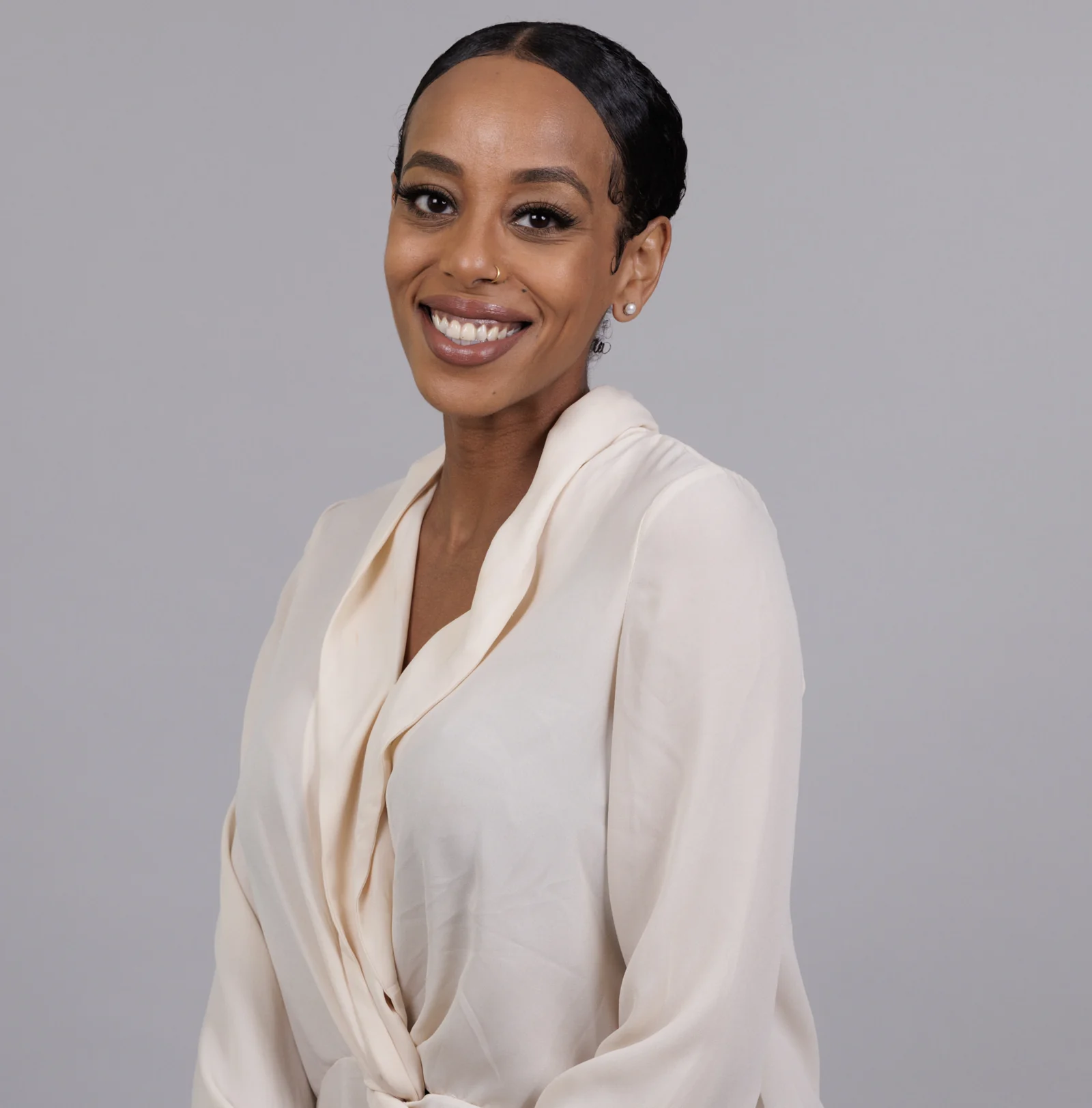 Sewit Tamene in her original cream blouse studio portrait